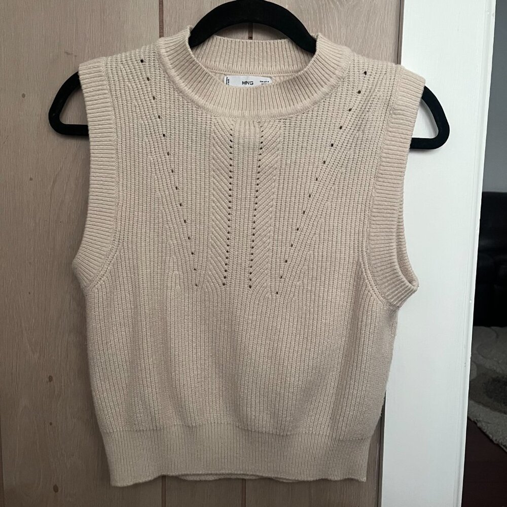 White sweater vest